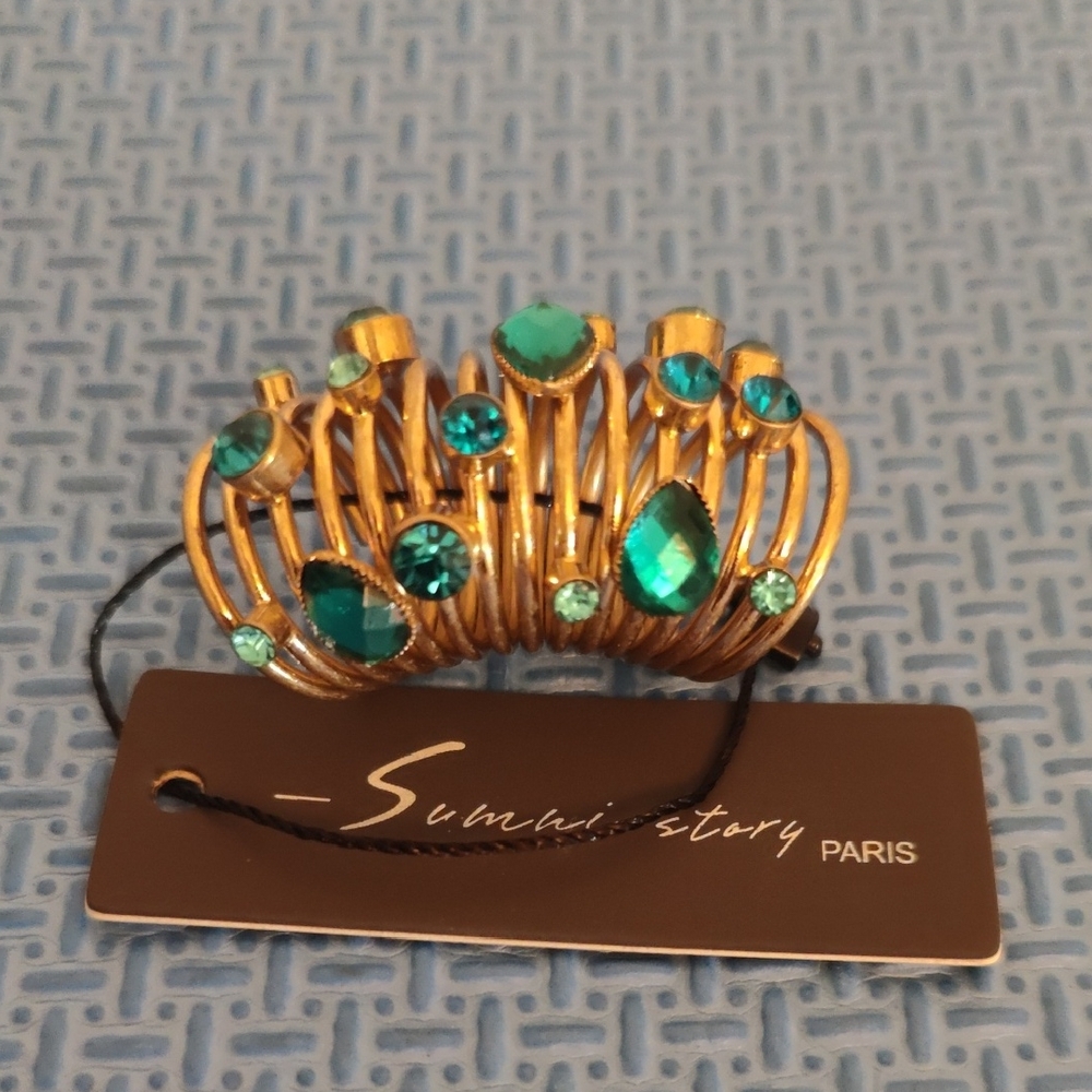 Amazon Gold-Tone Spiral Ring with Teal Gemstones